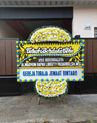 Papan Bunga Duka di Kertak Baru Ulu